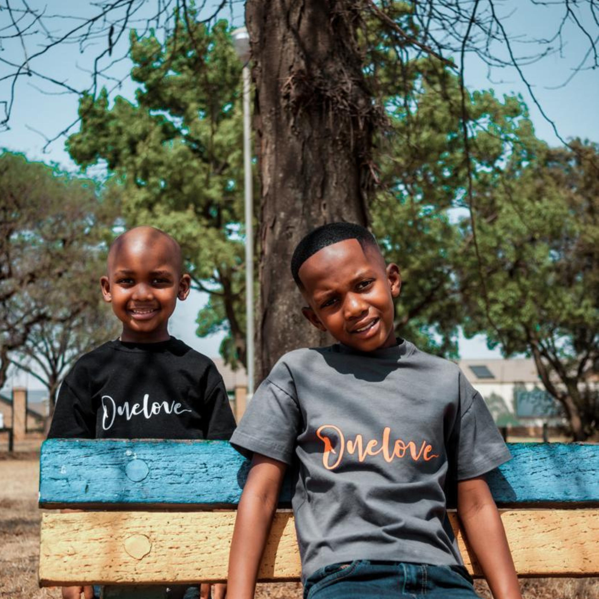 One Love Kids Unisex T-Shirts